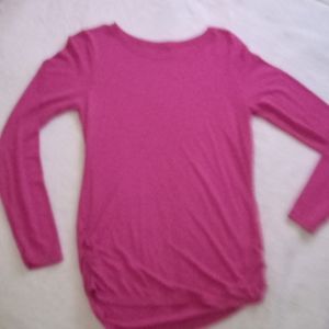 A pink long sleeve shirt